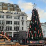 A Christmas tree decorated with large red candles, in the Christmas market in Birmingham