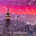 a city with snow falling