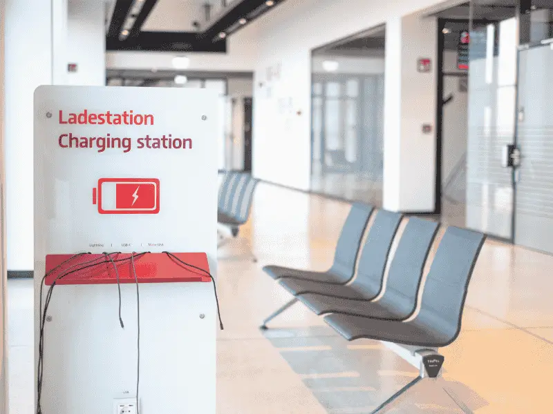 A phone charging station at the airport.