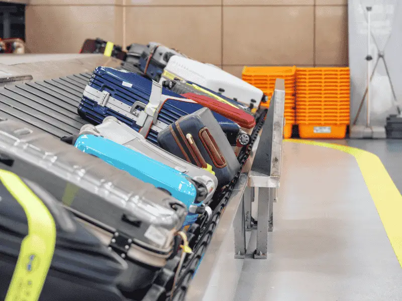 Luggage on a carousel, at the airport.