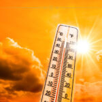A thermometer showing 40 degrees Celsius against an orange sky