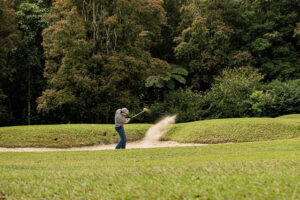 A man playing golf in Thailand